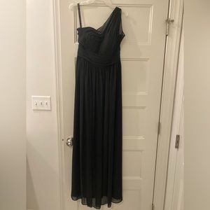 No stretch material. Only worn for a few hours and has since been dry cleaned.